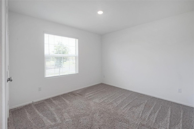 421 Bluejack Way, Hutto, TX 78634 - carpeted empty room with recessed lighting and baseboards