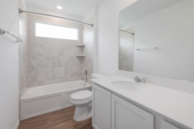421 Bluejack Way, Hutto, TX 78634 - bathroom featuring vanity, shower / washtub combination, and wood finished floors