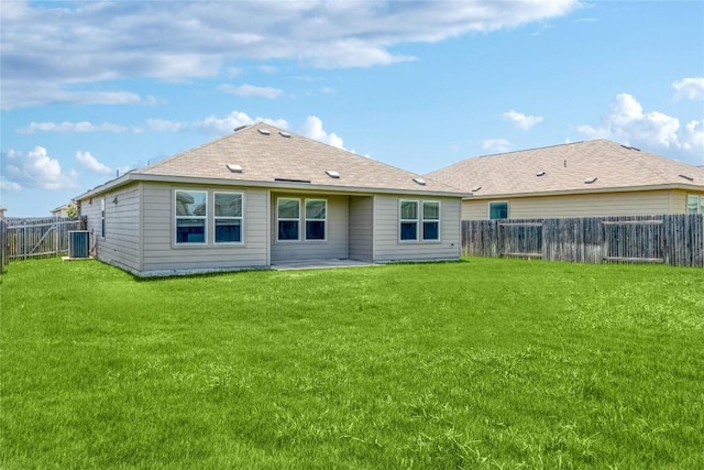 421 Bluejack Way, Hutto, TX 78634 - back of house with a fenced backyard