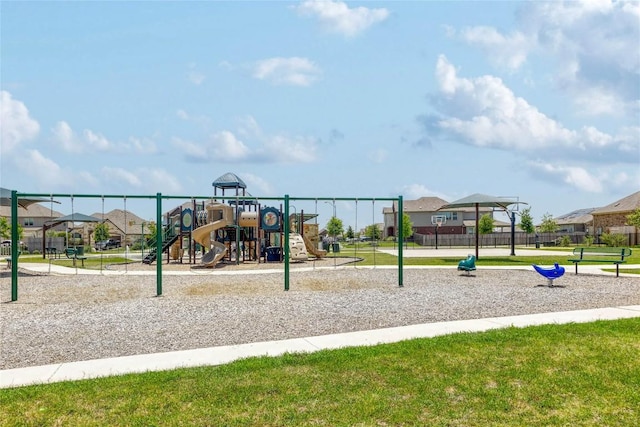 421 Bluejack Way, Hutto, TX 78634 - community jungle gym with a residential view