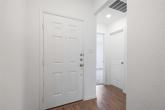 421 Bluejack Way, Hutto, TX 78634 - foyer entrance featuring wood finished floors and baseboards