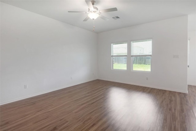 421 Bluejack Way, Hutto, TX 78634 - spare room featuring wood finished floors and ceiling fan