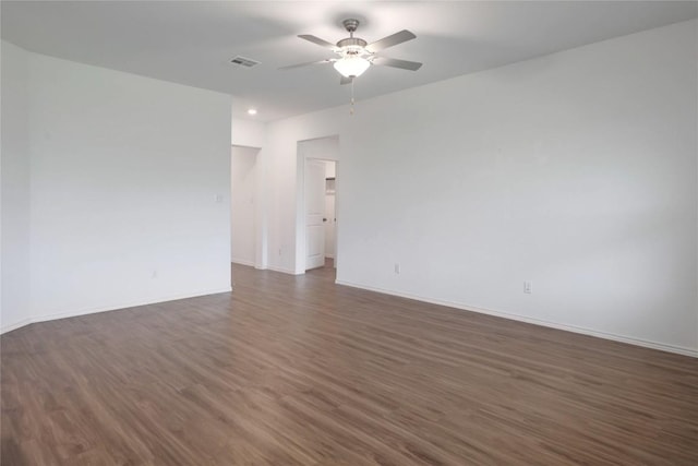 421 Bluejack Way, Hutto, TX 78634 - empty room with ceiling fan, dark wood finished floors, and recessed lighting