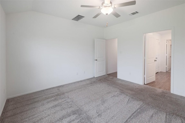 421 Bluejack Way, Hutto, TX 78634 - unfurnished bedroom with carpet floors, ceiling fan, and lofted ceiling