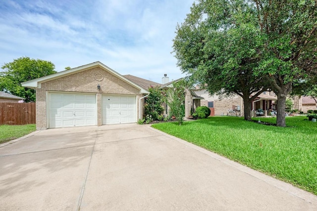 500 Olympic Dr, Pflugerville, TX 78660 - view of front of property with brick siding and driveway