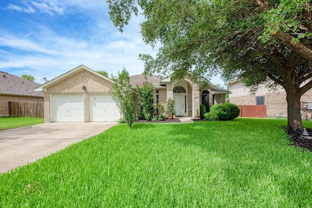 500 Olympic Dr, Pflugerville, TX 78660 - single story home with concrete driveway, brick siding, and a garage
