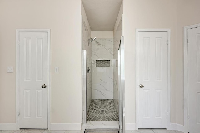 500 Olympic Dr, Pflugerville, TX 78660 - bathroom with a marble finish shower and baseboards