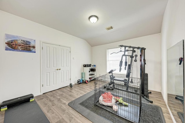 500 Olympic Dr, Pflugerville, TX 78660 - exercise area with wood finished floors and lofted ceiling