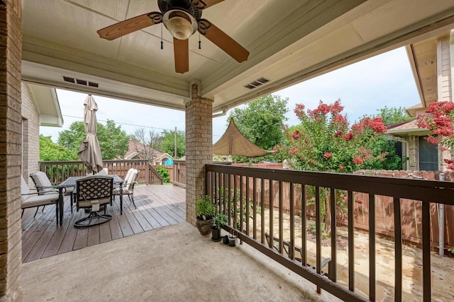 500 Olympic Dr, Pflugerville, TX 78660 - wooden deck with outdoor dining area and a ceiling fan