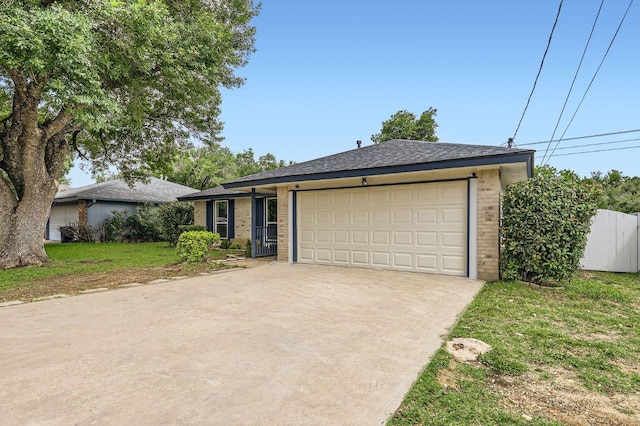 901 Garden Meadow Dr, Georgetown, TX 78628 - single story home featuring brick siding, concrete driveway, an attached garage, and a front yard