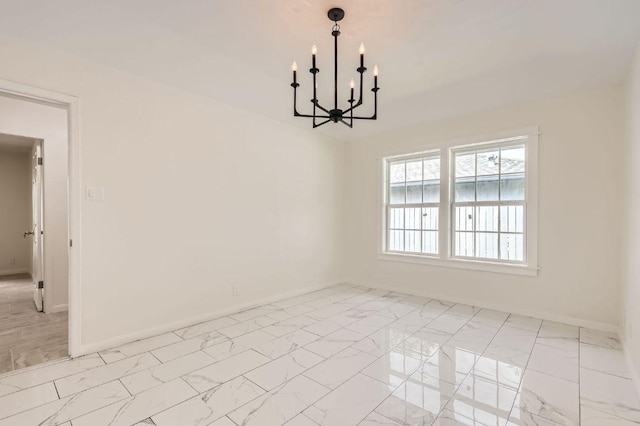 901 Garden Meadow Dr, Georgetown, TX 78628 - empty room featuring a chandelier and light marble finish flooring