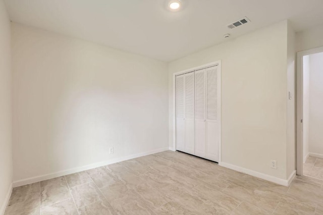 901 Garden Meadow Dr, Georgetown, TX 78628 - unfurnished bedroom featuring a closet and baseboards
