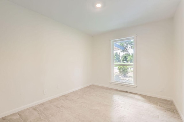 901 Garden Meadow Dr, Georgetown, TX 78628 - spare room with baseboards and light tile patterned floors