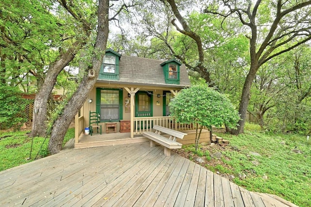 2500 Dana Cv, Austin, TX 78746 - view of front facade featuring a porch and roof with shingles