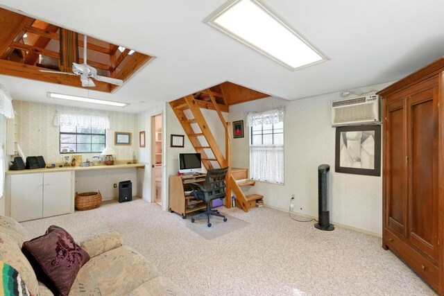 2500 Dana Cv, Austin, TX 78746 - office area with plenty of natural light, carpet, and a wall unit AC