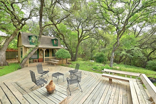 2500 Dana Cv, Austin, TX 78746 - wooden deck featuring an outdoor structure
