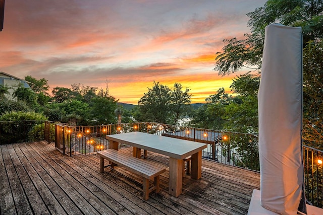8140 Joy Rd, Volente, TX 78641 - deck at dusk with outdoor dining area