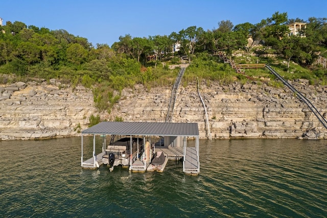 8140 Joy Rd, Volente, TX 78641 - dock area with boat lift and a water view
