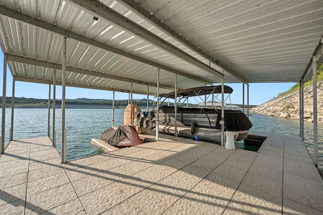8140 Joy Rd, Volente, TX 78641 - dock featuring boat lift and a water view