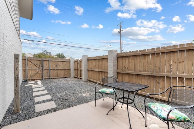 2122 Hancock Dr Unit 103, Austin, TX 78756 - fenced backyard featuring a patio and a gate