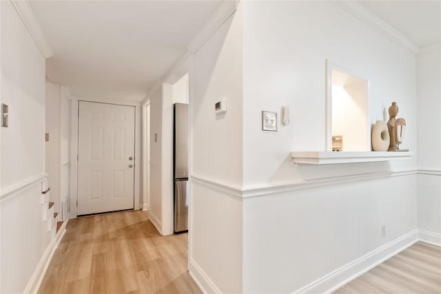 2122 Hancock Dr Unit 103, Austin, TX 78756 - corridor featuring light wood finished floors and ornamental molding