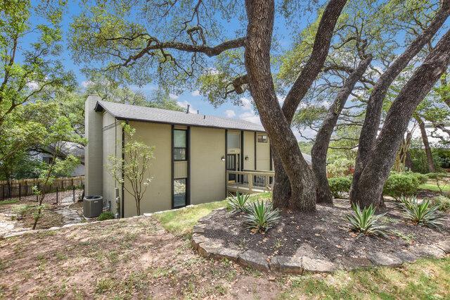 6203 Olympic Overlook Dr, Austin, TX 78746 - rear view of house with stucco siding