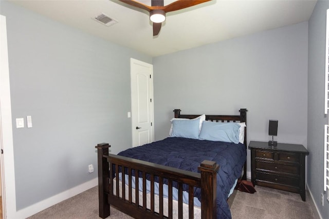 1328 Siena Sunset Rd, Leander, TX 78641 - carpeted bedroom with baseboards and a ceiling fan
