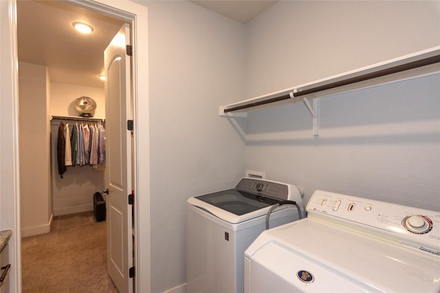 1328 Siena Sunset Rd, Leander, TX 78641 - laundry area featuring light colored carpet and washing machine and clothes dryer