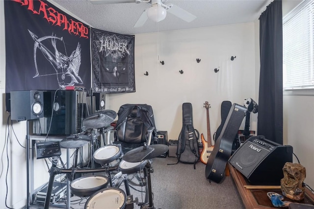 2721 Hemphill Park Unit B103, Austin, TX 78705 - game room with carpet, a ceiling fan, and a textured ceiling