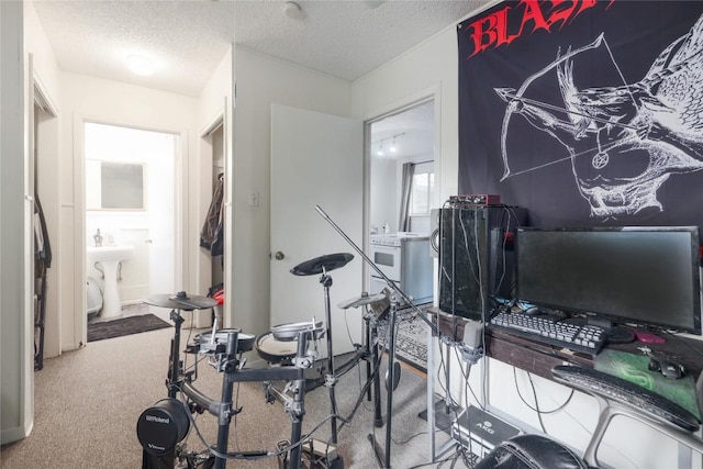 2721 Hemphill Park Unit B103, Austin, TX 78705 - exercise room with a textured ceiling and carpet