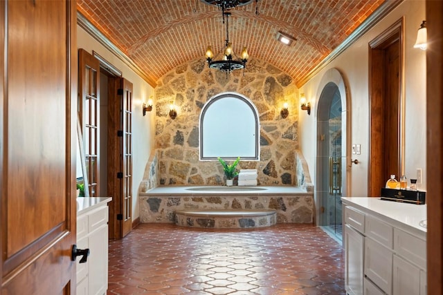 108 Country Vista Ln, Georgetown, TX 78626 - full bathroom featuring vanity, vaulted ceiling, a bath, ornamental molding, and a chandelier