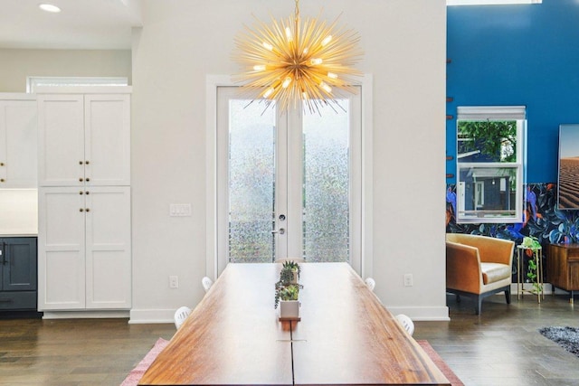 7000 Zachary Dr, Austin, TX 78724 - dining area featuring dark wood-style flooring, french doors, a chandelier, and recessed lighting