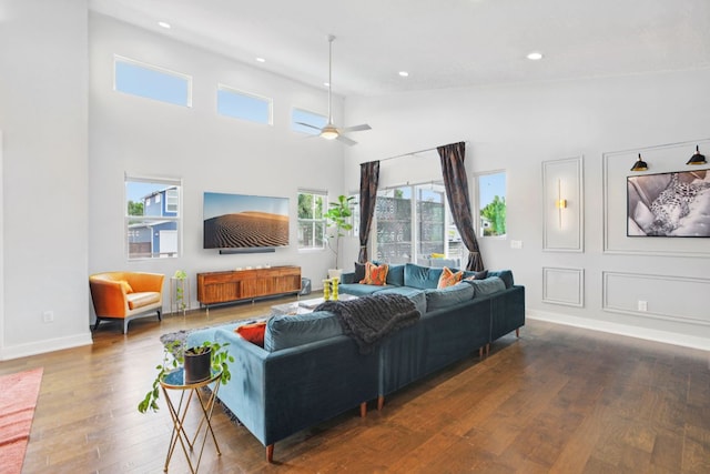 7000 Zachary Dr, Austin, TX 78724 - living area featuring hardwood / wood-style floors, recessed lighting, ceiling fan, and a high ceiling
