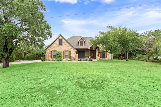 13 Mojave Ln, Belton, TX 76513 - view of front facade featuring a front lawn and stone siding