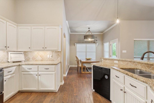 13 Mojave Ln, Belton, TX 76513 - kitchen with black dishwasher, backsplash, dark wood-style flooring, and ornamental molding