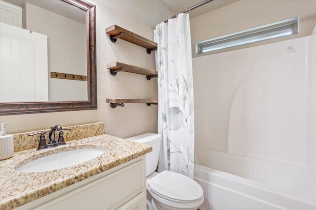 13 Mojave Ln, Belton, TX 76513 - full bathroom featuring vanity, shower / bath combo with shower curtain, and a textured wall