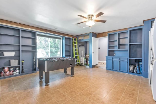 1102 Girard St, San Marcos, TX 78666 - playroom featuring ceiling fan, built in features, and light tile patterned flooring