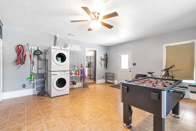1102 Girard St, San Marcos, TX 78666 - rec room with stacked washer and clothes dryer and ceiling fan