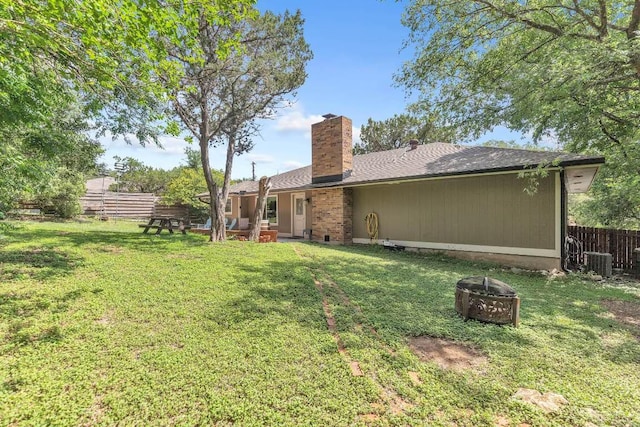 1102 Girard St, San Marcos, TX 78666 - view of yard with an outdoor fire pit