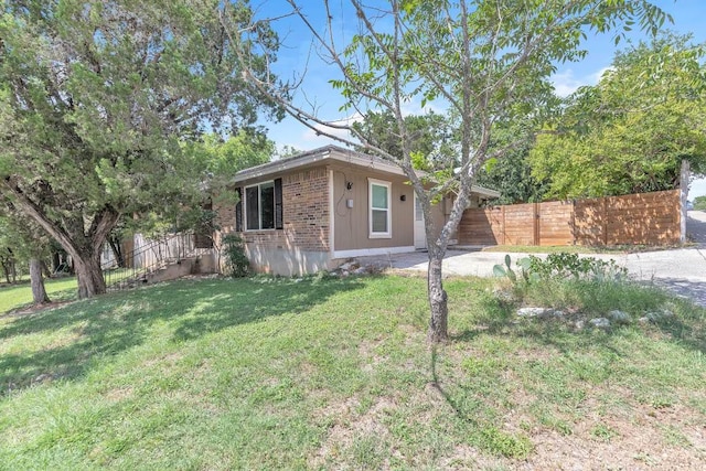 1102 Girard St, San Marcos, TX 78666 - view of front facade with brick siding