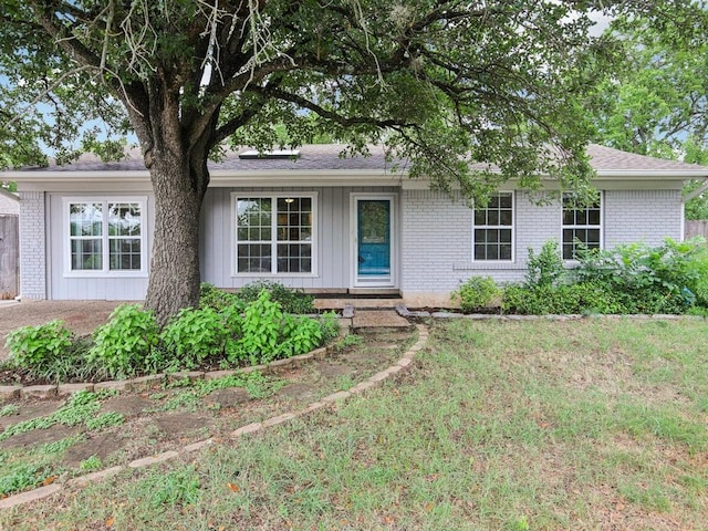 3811 Byron Dr, Austin, TX 78704 - ranch-style house featuring brick siding and a front yard