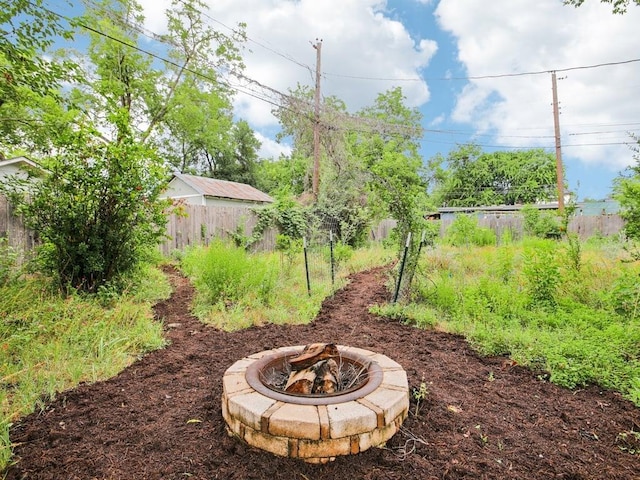3811 Byron Dr, Austin, TX 78704 - view of yard with a fire pit