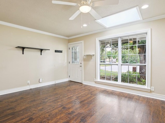 3811 Byron Dr, Austin, TX 78704 - unfurnished room featuring crown molding, wood finished floors, ceiling fan, a skylight, and recessed lighting