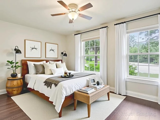 3811 Byron Dr, Austin, TX 78704 - bedroom with dark wood-type flooring and ceiling fan