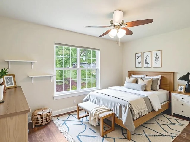 3811 Byron Dr, Austin, TX 78704 - bedroom with wood finished floors and a ceiling fan
