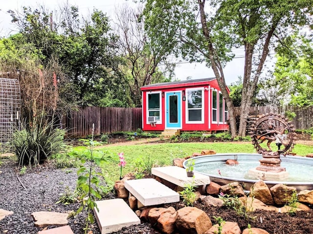 3811 Byron Dr, Austin, TX 78704 - fenced backyard featuring an outbuilding