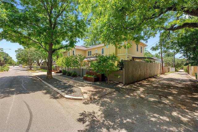 1403 W 12th St Unit B, Austin, TX 78703 - view of asphalt road with sidewalks, street lights, curbs, and a residential view
