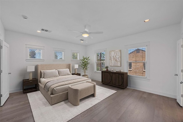 1403 W 12th St Unit B, Austin, TX 78703 - bedroom with wood finished floors, a ceiling fan, and recessed lighting