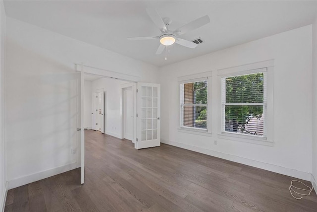 1403 W 12th St Unit B, Austin, TX 78703 - unfurnished room featuring wood finished floors, french doors, and ceiling fan