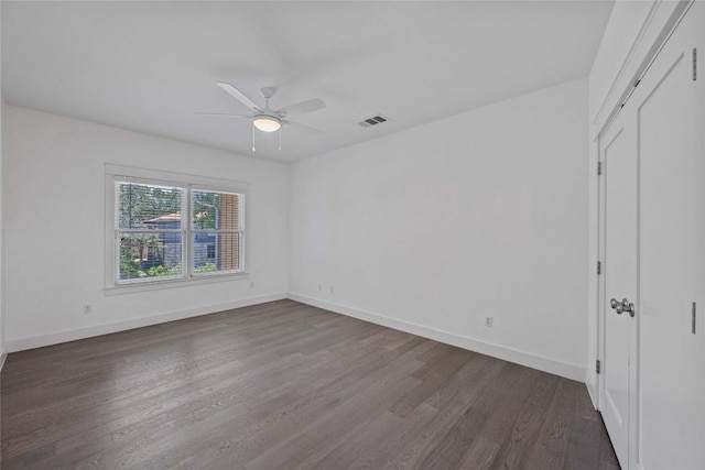 1403 W 12th St Unit B, Austin, TX 78703 - empty room featuring a ceiling fan and dark wood finished floors